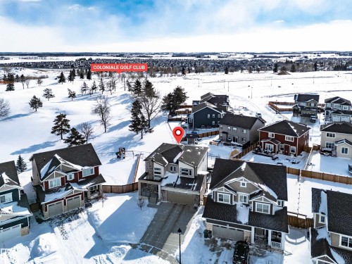 Snowy aerial view with a residential view - 11 Promenade Point(E), Beaumont, AB - Outdoor