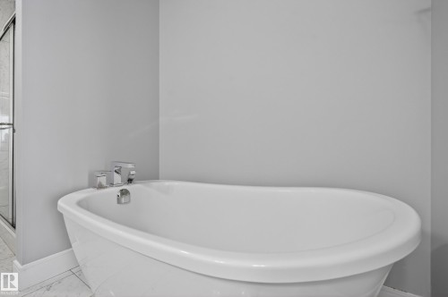 Bathroom with a freestanding tub and a shower stall - 3224 160 Street, Edmonton, AB - Indoor Photo Showing Bathroom