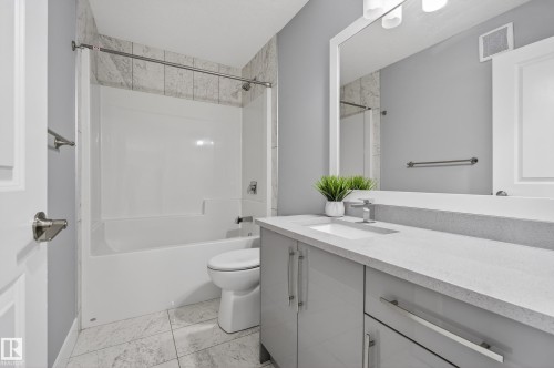 Full bathroom featuring vanity and bathing tub / shower combination - 3224 160 Street, Edmonton, AB - Indoor Photo Showing Bathroom
