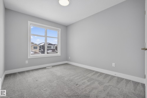 Carpeted spare room featuring baseboards - 3224 160 Street, Edmonton, AB - Indoor Photo Showing Other Room