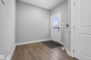 Doorway to outside featuring baseboards and wood finished floors - 3224 160 Street, Edmonton, AB  - Indoor Photo Showing Other Room 