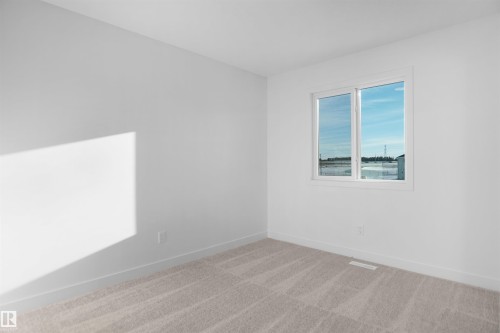 115 Ficus Way, Fort Saskatchewan, AB - Indoor Photo Showing Other Room