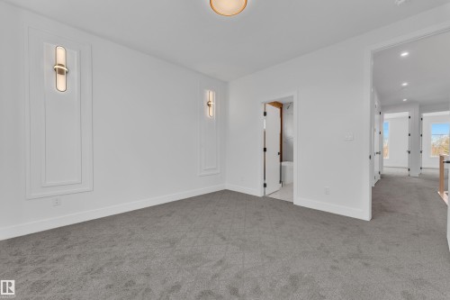 Carpeted spare room with recessed lighting and baseboards - 6111 Crawford Drive, Edmonton, AB - Indoor Photo Showing Other Room