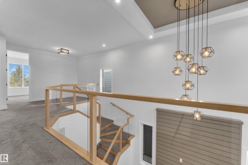 Hall featuring an upstairs landing, carpet flooring, and recessed lighting - 6111 Crawford Drive, Edmonton, AB - Indoor Photo Showing Other Room