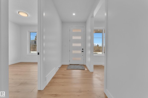Foyer with light wood finished floors and recessed lighting - 6111 Crawford Drive, Edmonton, AB - Indoor Photo Showing Other Room