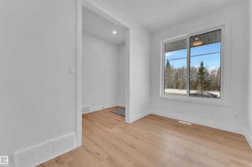 Spare room with recessed lighting and light wood-type flooring - 6111 Crawford Drive, Edmonton, AB - Indoor Photo Showing Other Room