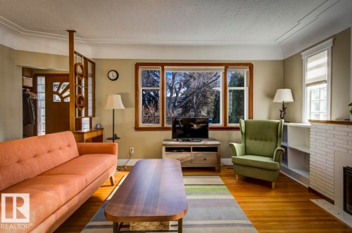 10714 128 Street, Edmonton, AB - Indoor Photo Showing Living Room With Fireplace