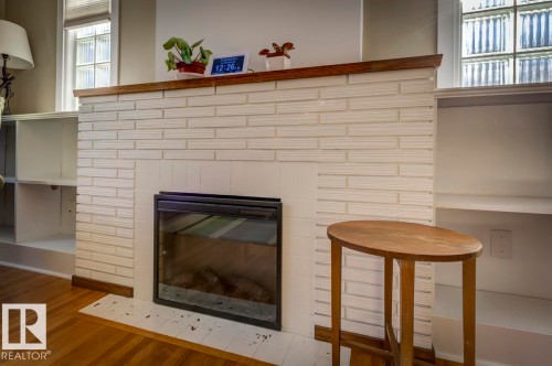 10714 128 Street, Edmonton, AB - Indoor Photo Showing Living Room With Fireplace