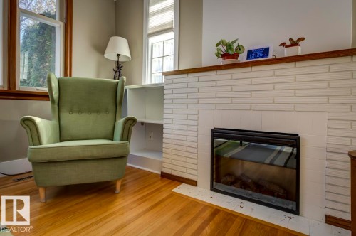 10714 128 Street, Edmonton, AB - Indoor Photo Showing Living Room With Fireplace