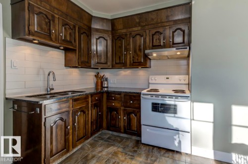 10714 128 Street, Edmonton, AB - Indoor Photo Showing Kitchen With Double Sink