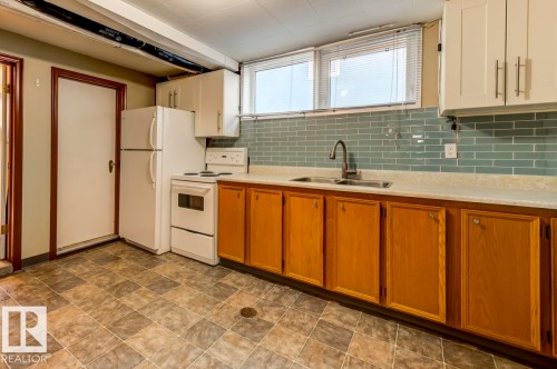 10714 128 Street, Edmonton, AB - Indoor Photo Showing Kitchen With Double Sink