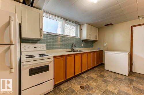 10714 128 Street, Edmonton, AB - Indoor Photo Showing Kitchen With Double Sink