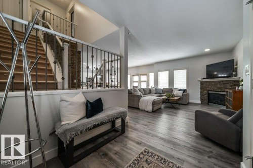 5211 Cercle Ciel, Beaumont, AB - Indoor Photo Showing Living Room With Fireplace