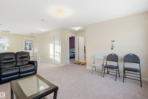 Bonus room featuring light carpet and baseboards - 2923 16 Street, Edmonton, AB - Indoor Photo Showing Living Room
