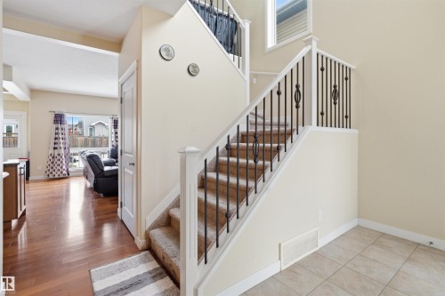 Staircase with baseboards - 2923 16 Street, Edmonton, AB - Indoor Photo Showing Other Room