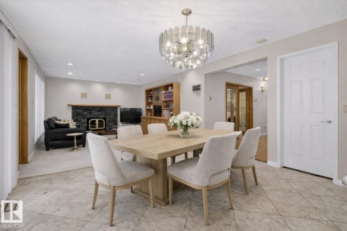 470 Rooney Crescent, Edmonton, AB - Indoor Photo Showing Dining Room With Fireplace