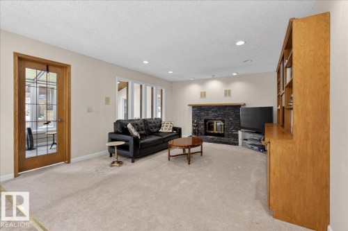 470 Rooney Crescent, Edmonton, AB - Indoor Photo Showing Living Room With Fireplace