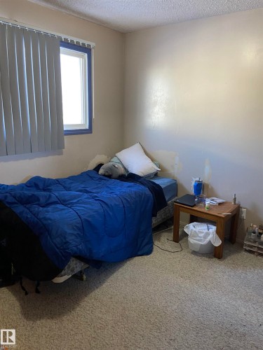 9 5325 48 Avenue, Redwater, AB - Indoor Photo Showing Bedroom