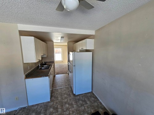 206 11421 34St, Edmonton, AB - Indoor Photo Showing Kitchen With Double Sink