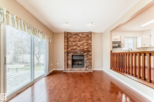1923 52 Street Nw, Edmonton, AB - Indoor Photo Showing Living Room With Fireplace