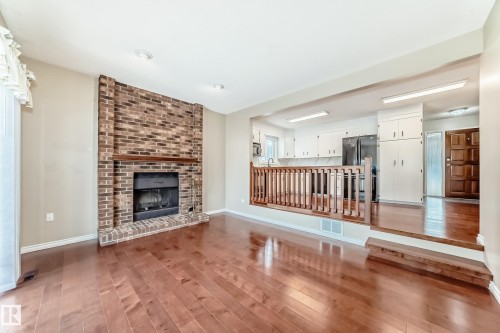 1923 52 Street Nw, Edmonton, AB - Indoor Photo Showing Living Room With Fireplace