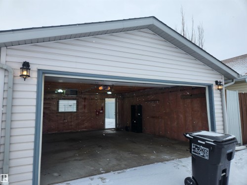 Garage featuring a heating unit - 14076 152 Avenue, Edmonton, AB - Outdoor With Exterior