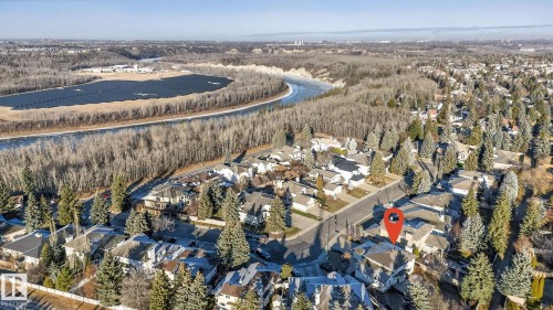 Aerial view of property and surrounding area with a large body of water and nearby suburban area - 313 Hedley Way, Edmonton, AB - Outdoor With View