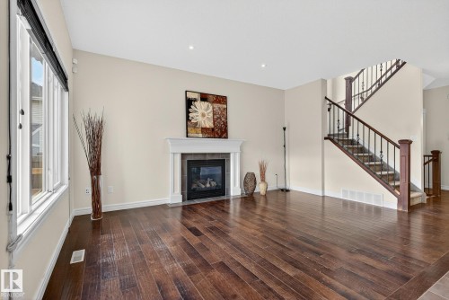 7915 18 Ave, Edmonton, AB - Indoor Photo Showing Living Room With Fireplace