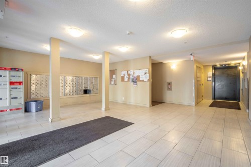 Lobby featuring a textured ceiling - 415 111 Watt Common, Edmonton, AB - Indoor Photo Showing Other Room