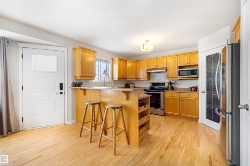 8818 Rowland Road, Edmonton, AB - Indoor Photo Showing Kitchen With Stainless Steel Kitchen