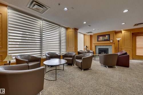1302 10721 Saskatchewan Drive, Edmonton, AB - Indoor With Fireplace