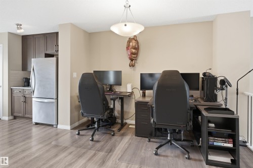 Dining/Office area with light wood-type flooring - 48 1140 Chappelle Boulevard, Edmonton, AB - Indoor Photo Showing Office