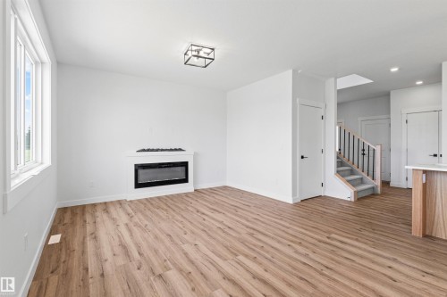 5002 53 Ave, Calmar, AB - Indoor With Fireplace