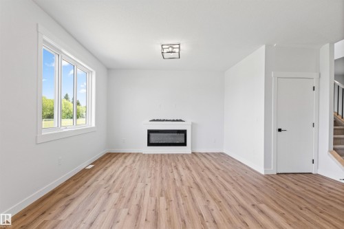 5002 53 Ave, Calmar, AB - Indoor With Fireplace