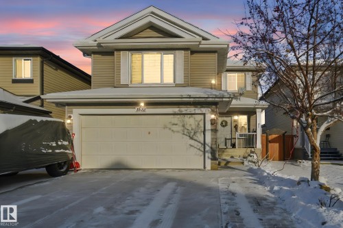 View of front facade with an attached garage and concrete driveway - 1532 37C Avenue, Edmonton, AB - Outdoor