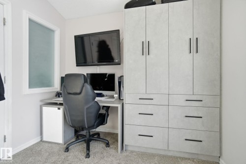 Office featuring baseboards and light colored carpet - 1532 37C Avenue, Edmonton, AB - Indoor Photo Showing Office