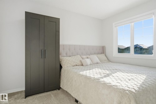 Bedroom with light colored carpet - 1532 37C Avenue, Edmonton, AB - Indoor Photo Showing Bedroom