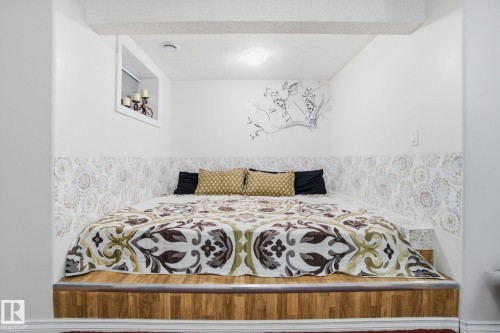 Bedroom with a textured ceiling - 1532 37C Avenue, Edmonton, AB - Indoor Photo Showing Other Room