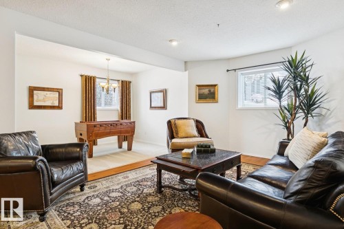 22 Prestige Point(E), Edmonton, AB - Indoor Photo Showing Living Room