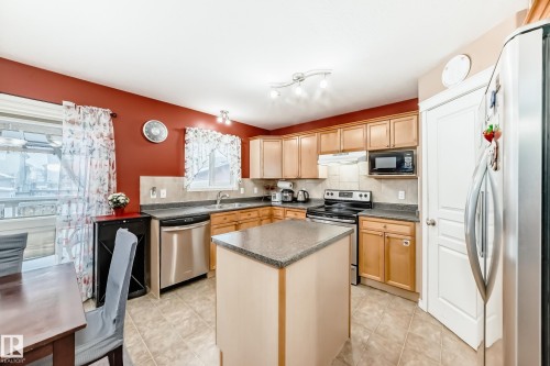 113 Keystone Lane, Leduc, AB - Indoor Photo Showing Kitchen With Double Sink