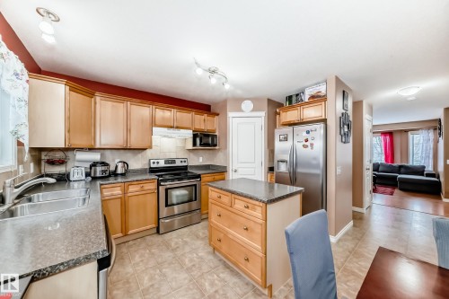 113 Keystone Lane, Leduc, AB - Indoor Photo Showing Kitchen With Double Sink