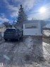 View of front of property with crawl space - #44 9501 104 Ave, Westlock, AB  - Outdoor 