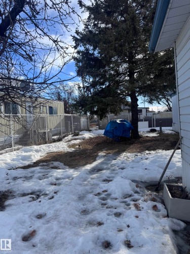 View of snowy yard - #44 9501 104 Ave, Westlock, AB - Outdoor