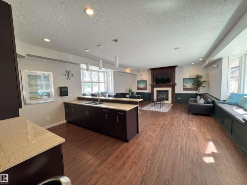 406 667 Watt Boulevard, Edmonton, AB - Indoor With Fireplace