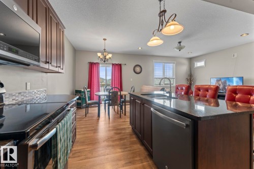 302 A Aurora Way, Cold Lake, AB - Indoor Photo Showing Kitchen With Double Sink