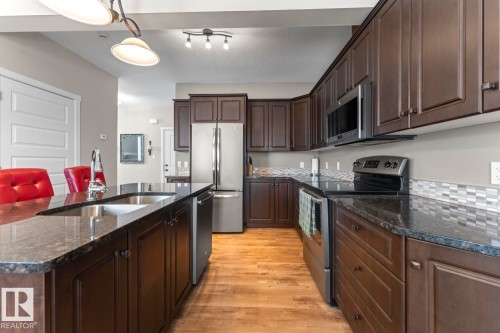 302 A Aurora Way, Cold Lake, AB - Indoor Photo Showing Kitchen With Stainless Steel Kitchen With Double Sink With Upgraded Kitchen