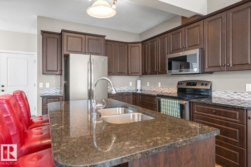 302 A Aurora Way, Cold Lake, AB - Indoor Photo Showing Kitchen With Stainless Steel Kitchen With Double Sink With Upgraded Kitchen