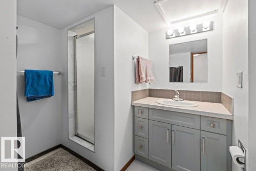 Full bath with vanity and a shower stall - 1 Larkspur Crescent, St. Albert, AB - Indoor Photo Showing Bathroom