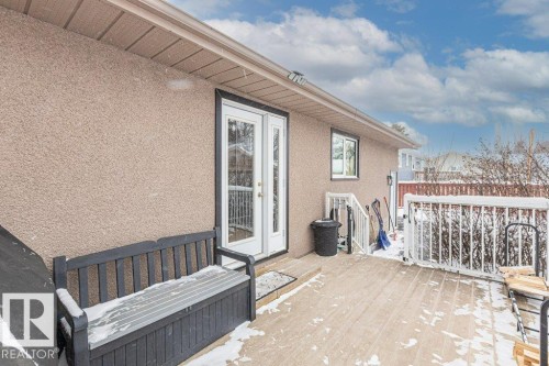 Wooden deck with french doors - 1 Larkspur Crescent, St. Albert, AB - Outdoor With Deck Patio Veranda With Exterior