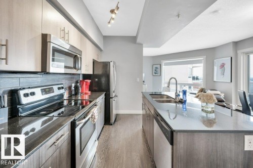 2107 10226 104 Street, Edmonton, AB - Indoor Photo Showing Kitchen With Double Sink With Upgraded Kitchen